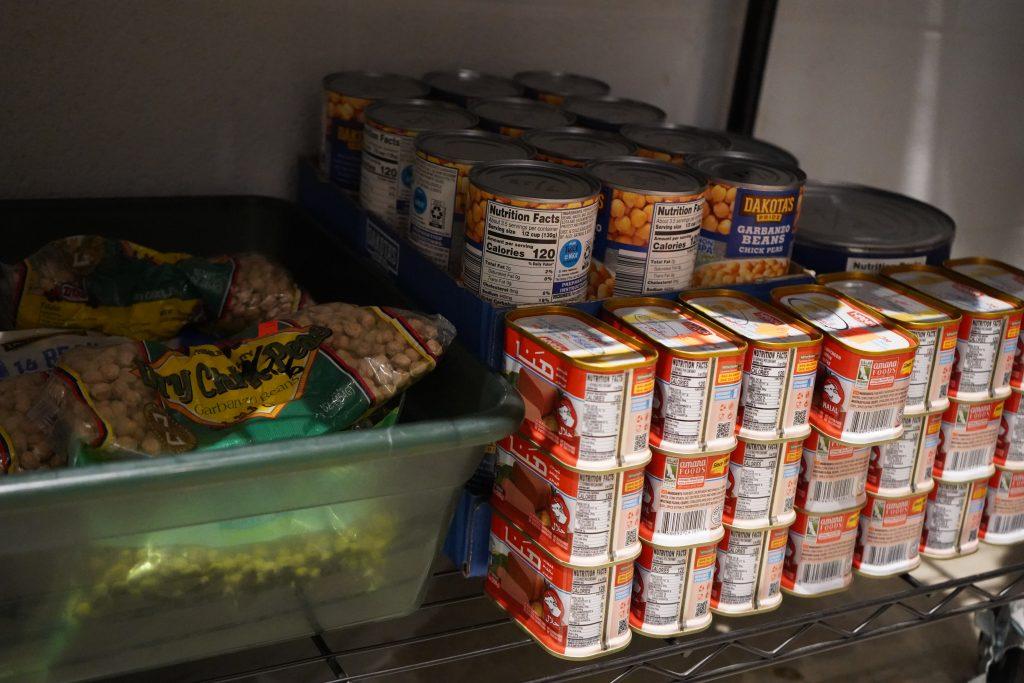 Image of Center of Grace food pantry items including chickpeas and halal meat