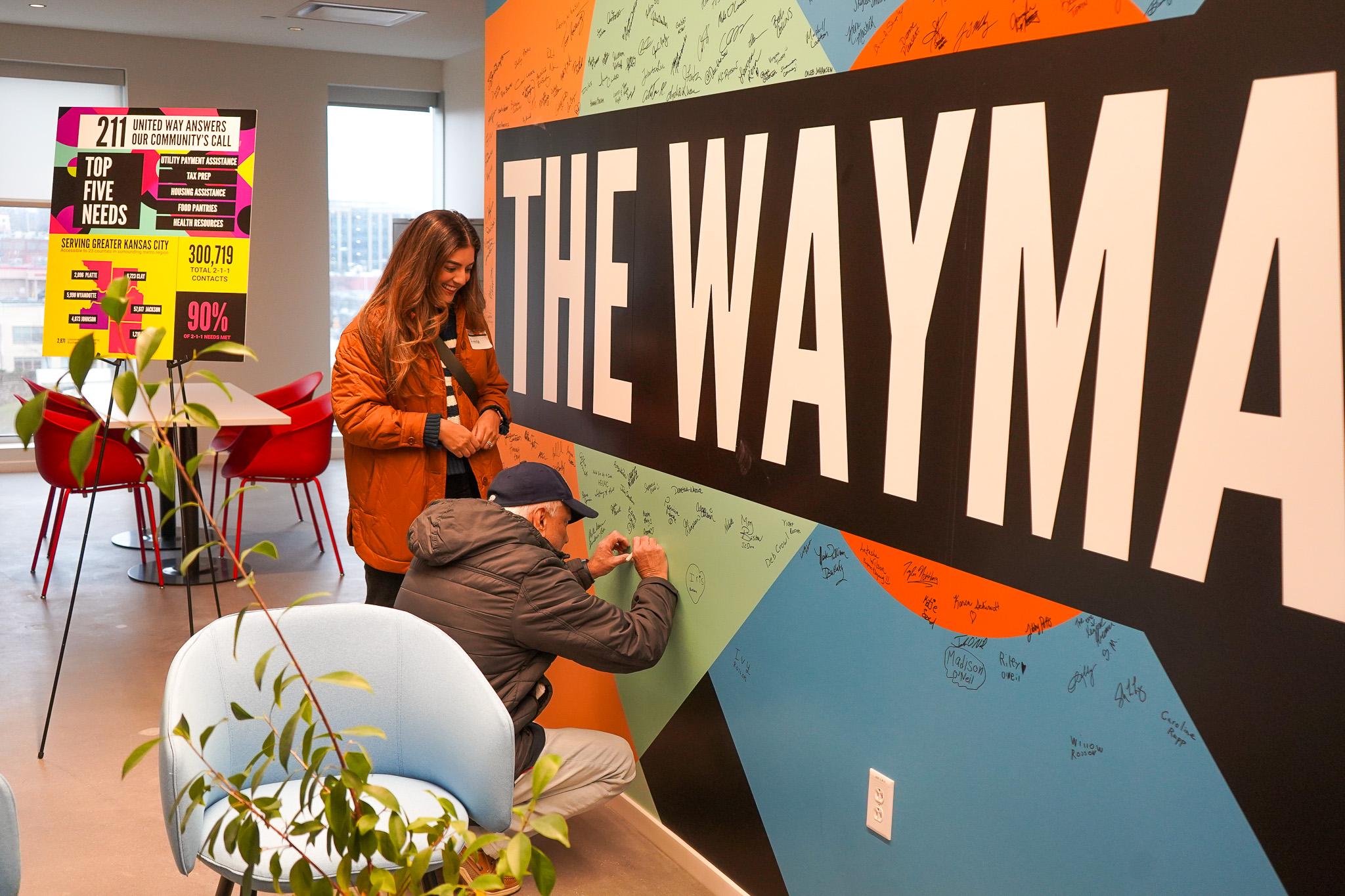 Image of guests signing Waymaker Wall Image of guests chatting in CommUNITY Space at United Way of Greater Kansas City