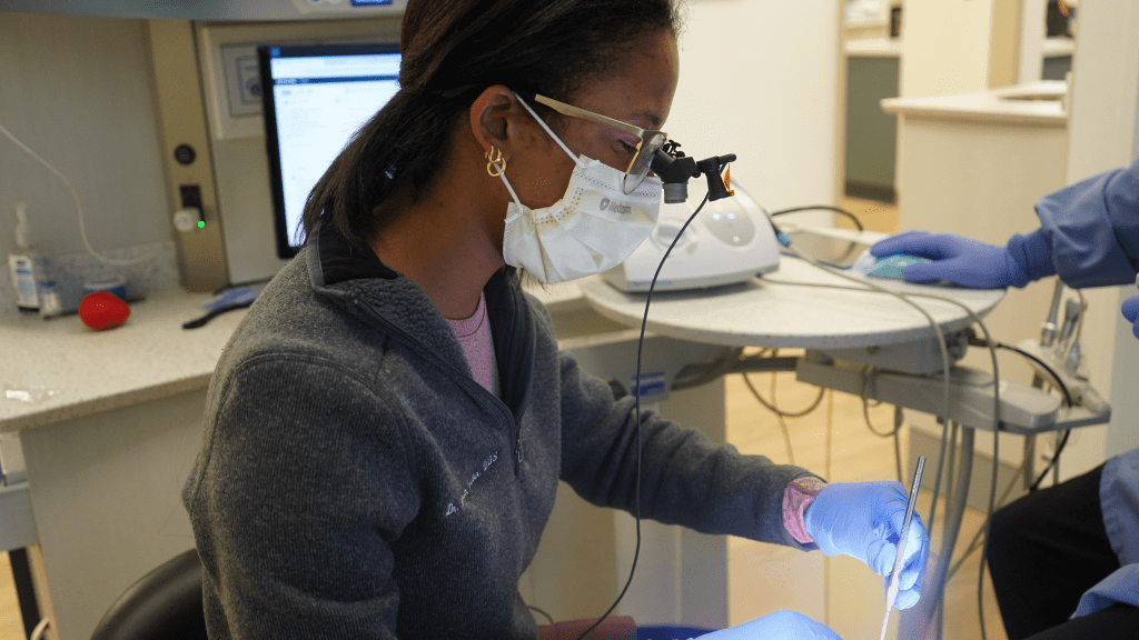 Image of dental hygienist at United Way Impact 100 partner Cass County Dental Clinic